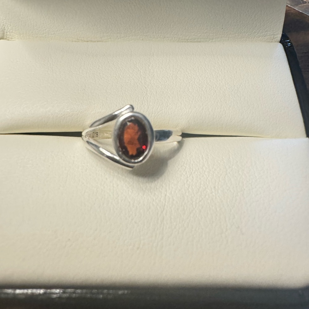 Elegant Silver Ring with Red Gemstone